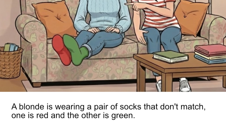 A blonde is wearing a pair of socks that don’t match